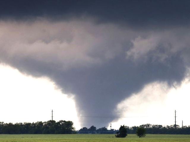 A-large-tornado-passes-just-to-the-west-of-the-city-of-Halstead-in-US-AP-Photo A-large-tornado-passes-just-to-the-west-of-the-city-of-Halstead-in-US-AP-Photo
