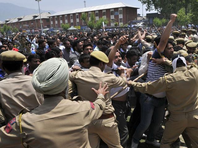 Dozens of government employees were detained as they tried to stage a protest march to voice their demands for the regularisation of jobs in Srinagar. Waseem Andrabi/HT