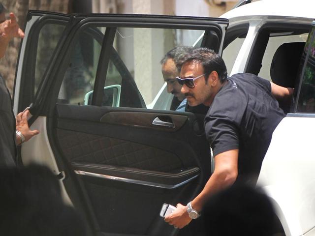 Actor Ajay Devgan visits Salman Khan at his Bandra residence in Mumbai. (HT Photo/Satish Bate)