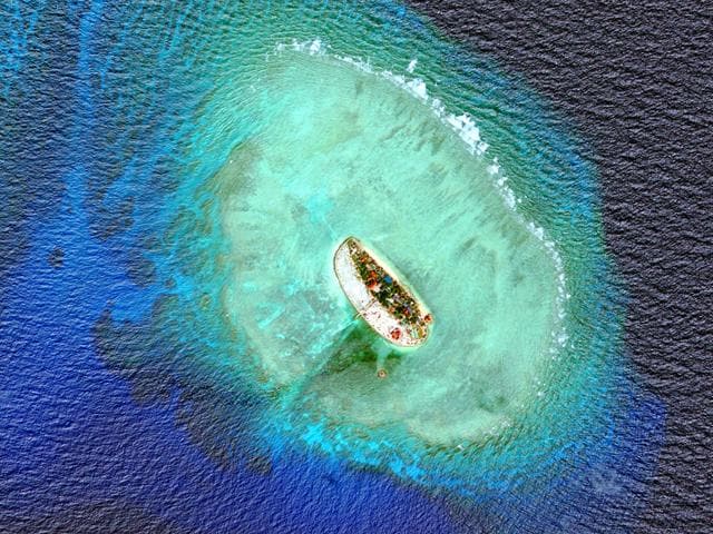 New-satellite-images-show-Vietnam-has-carried-out-significant-land-reclamation-at-two-sites-in-the-disputed-South-China-Sea-but-the-scale-and-pace-of-the-work-is-dwarfed-by-that-of-China-a-US-research-institute-said-Reuters