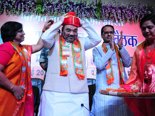 BJP-president-Amit-Shah-being-welcomed-during-the-national-executive-committee-meeting-of-the-BJP-Mahila-Morcha-at-the-state-BJP-office-in-Bhopal-on-Sunday-Mujeeb-Faruqui-HT-photo BJP-president-Amit-Shah-being-welcomed-during-the-national-executive-committee-meeting-of-the-BJP-Mahila-Morcha-at-the-state-BJP-office-in-Bhopal-on-Sunday-Mujeeb-Faruqui-HT-photo