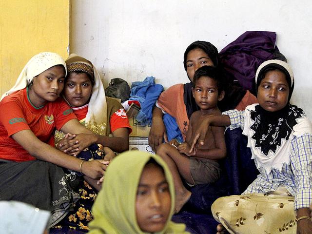 Migrants-believed-to-be-Rohingya-eat-inside-a-shelter-after-being-rescued-from-boats-in-Lhoksukon-Indonesia-s-Aceh-Province-Reuters-Photo Migrants-believed-to-be-Rohingya-eat-inside-a-shelter-after-being-rescued-from-boats-in-Lhoksukon-Indonesia-s-Aceh-Province-Reuters-Photo