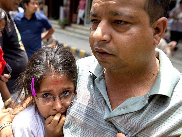People-moving-out-into-the-open-after-an-earthquake-measuring-7-3-in-magnitude-hit-Nepal-on-Tuesday-Reuters People-moving-out-into-the-open-after-an-earthquake-measuring-7-3-in-magnitude-hit-Nepal-on-Tuesday-Reuters