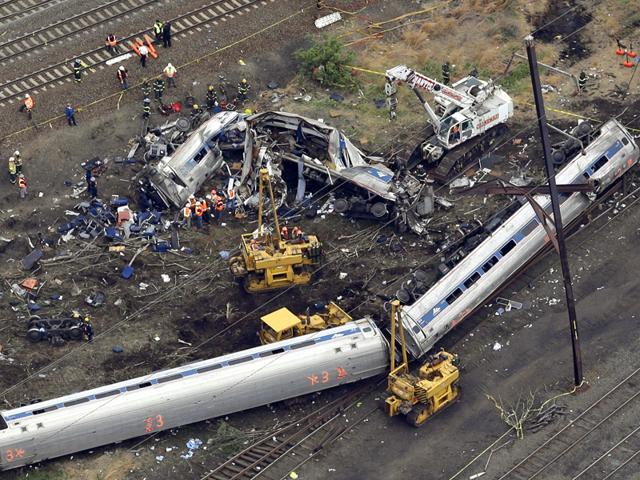Emergency-workers-look-through-the-remains-of-a-derailed-Amtrak-train-in-Philadelphia-Pennsylvania-Rescue-workers-on-Wednesday-sifted-through-twisted-metal-and-debris-from-the-wreck-of-the-Amtrak-train-that-derailed-in-Philadelphia-killing-six-people-and-injuring-scores-of-others-as-investigators-began-reviewing-data-to-determine-the-cause-of-an-accident-Reuters-Photo Emergency-workers-look-through-the-remains-of-a-derailed-Amtrak-train-in-Philadelphia-Pennsylvania-Rescue-workers-on-Wednesday-sifted-through-twisted-metal-and-debris-from-the-wreck-of-the-Amtrak-train-that-derailed-in-Philadelphia-killing-six-people-and-injuring-scores-of-others-as-investigators-began-reviewing-data-to-determine-the-cause-of-an-accident-Reuters-Photo