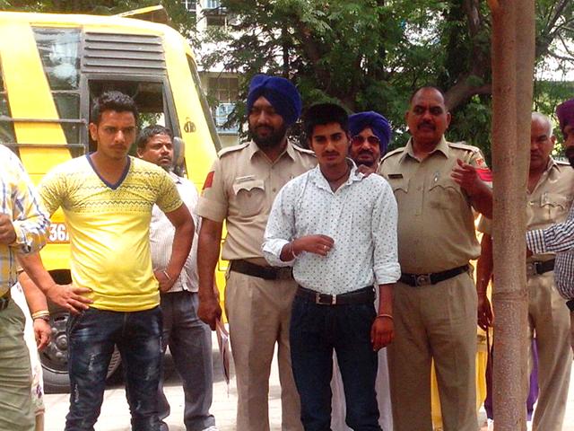 The-accused-bus-conductor-in-police-custody-in-Chandigarh-on-Wednesday-HT-Photo