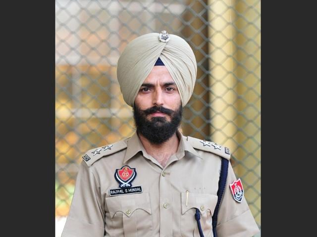 Former-Indian-hockey-star-Rajpal-Singh-who-is-a-DSP-with-Punjab-Police-is-leading-the-police-team-that-provides-the-inner-circle-of-security-during-IPL-matches-in-Mohali