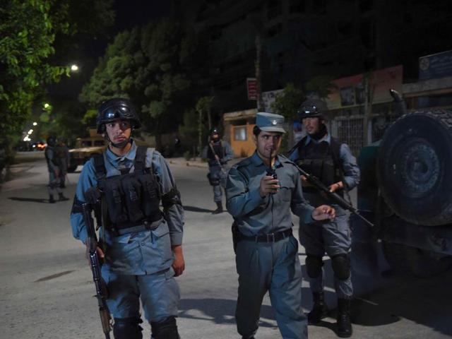 Afghan-security-forces-stand-guard-at-the-site-of-an-attack-in-Kabul-May-13-2015-Gunmen-stormed-a-building-in-an-upmarket-area-of-the-Afghan-capital-Kabul-on-Wednesday-night-and-shooting-was-continuing-an-army-commander-said-Reuters-Photo Afghan-security-forces-stand-guard-at-the-site-of-an-attack-in-Kabul-May-13-2015-Gunmen-stormed-a-building-in-an-upmarket-area-of-the-Afghan-capital-Kabul-on-Wednesday-night-and-shooting-was-continuing-an-army-commander-said-Reuters-Photo