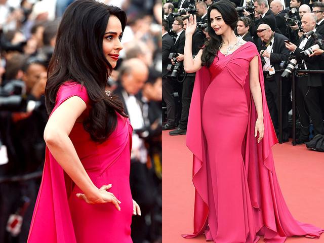 Mallika Sherawat waves as she arrives for the screening of the film Mad Max: Fury Road during the 68th Cannes Film Festival in Cannes on Friday. (AFP photo)