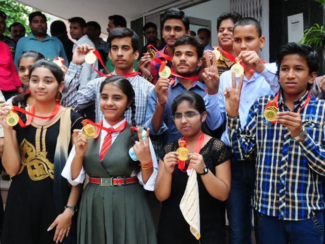 File-photo-of-school-students-discussing-their-exam-question-paper-PTI-photo