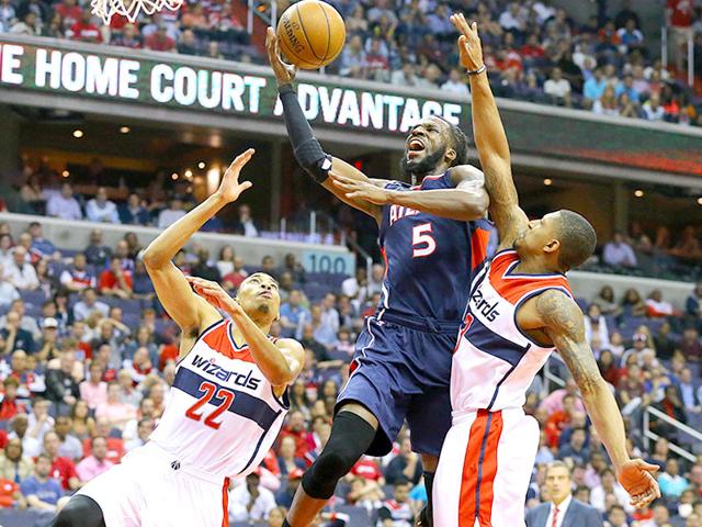 Atlanta-Hawks-Demarre-Carroll-draws-a-foul-from-Washington-Wizards-Bradley-Beal-on-his-way-to-the-basket-during-Game-6-of-an-NBA-basketball-second-round-playoff-series-in-Washington-The-Hawks-won-94-91-and-advanced-to-the-Eastern-Conference-finals-AP-PHOTO Atlanta-Hawks-Demarre-Carroll-draws-a-foul-from-Washington-Wizards-Bradley-Beal-on-his-way-to-the-basket-during-Game-6-of-an-NBA-basketball-second-round-playoff-series-in-Washington-The-Hawks-won-94-91-and-advanced-to-the-Eastern-Conference-finals-AP-PHOTO