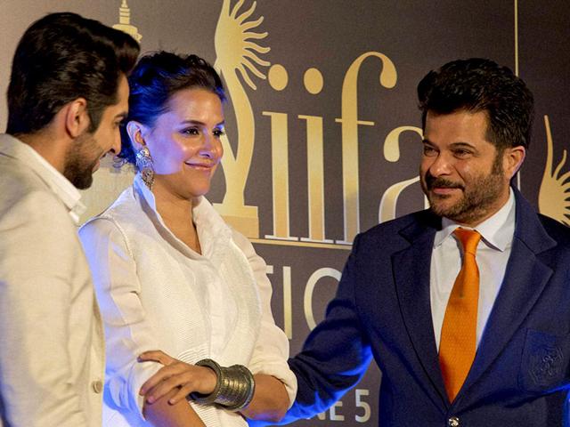 Ayushmann Khurrana, Neha Dhupia and Anil Kapoor at a press conference to announce the IIFA award ceremony to be held in Kuala Lumpur. (PTI Photo) Ayushmann Khurrana, Neha Dhupia and Anil Kapoor at a press conference to announce the IIFA award ceremony to be held in Kuala Lumpur. (PTI Photo)