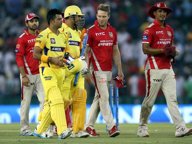 Chennai Super Kings players MS Dhoni and Suresh Raina celebrating their victory against Kings X1 Punjab during an IPL match being played at PCA stadium in Mohali, on Saturday. Gurpreet Singh /HT
