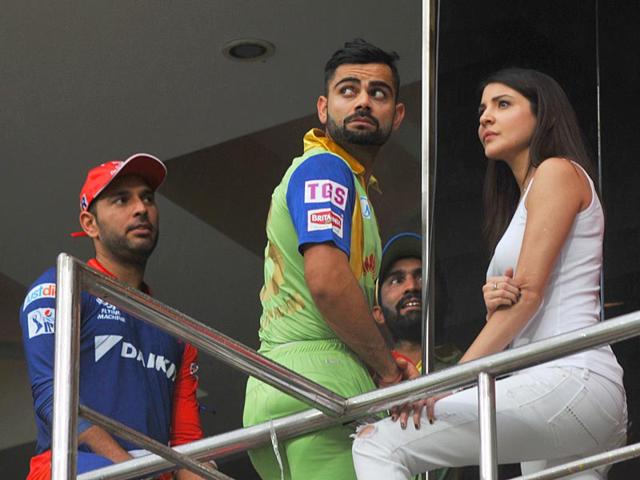 Royal-Challengers-Bangalore-RCB-skipper-Virat-Kohli-with-his-girlfriend-Anushka-Sharma-while-the-IPL-2015-match-between-RCB-and-Delhi-Daredevils-DD-was-interrupted-due-to-rain-in-Bangalore-on-May-18-PTI-Photo Royal-Challengers-Bangalore-RCB-skipper-Virat-Kohli-with-his-girlfriend-Anushka-Sharma-while-the-IPL-2015-match-between-RCB-and-Delhi-Daredevils-DD-was-interrupted-due-to-rain-in-Bangalore-on-May-18-PTI-Photo