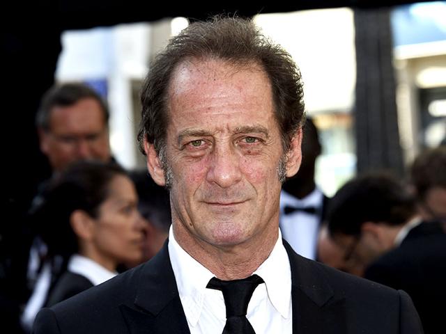 French-actor-Vincent-Lindon-poses-before-leaving-the-festival-palace-after-the-screening-of-the-film-La-Loi-du-Marche-The-Measure-of-a-Man-at-the-68th-Cannes-Film-Festival-in-Cannes-France-on-May-18-2015-AFP French-actor-Vincent-Lindon-poses-before-leaving-the-festival-palace-after-the-screening-of-the-film-La-Loi-du-Marche-The-Measure-of-a-Man-at-the-68th-Cannes-Film-Festival-in-Cannes-France-on-May-18-2015-AFP