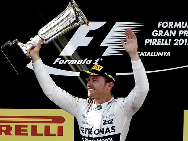 Mercedes-AMG-Petronas-F1-Team-s-German-driver-Nico-Rosberg-celebrates-on-the-podium-after-the-Spanish-Formula-One-Grand-Prix-at-the-Circuit-de-Catalunya-in-Montmelo-on-the-outskirts-of-Barcelona-AFP-PHOTO Mercedes-AMG-Petronas-F1-Team-s-German-driver-Nico-Rosberg-celebrates-on-the-podium-after-the-Spanish-Formula-One-Grand-Prix-at-the-Circuit-de-Catalunya-in-Montmelo-on-the-outskirts-of-Barcelona-AFP-PHOTO