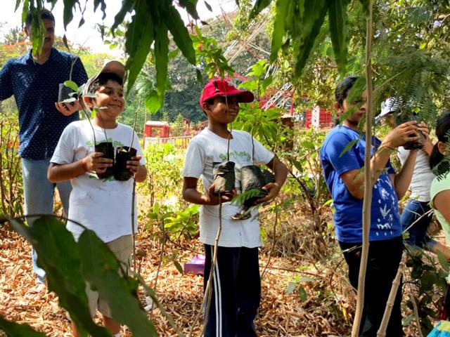 Around-20-people-along-with-10-children-were-a-part-of-the-plantation-drive-in-Mumbai-HT-photo Around-20-people-along-with-10-children-were-a-part-of-the-plantation-drive-in-Mumbai-HT-photo