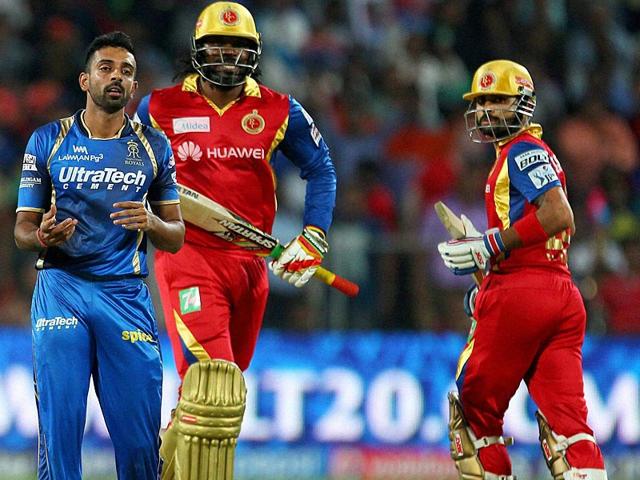 Disciplined bowling from RR bowlers pegged back RCB openers Chris Gayle and Virat Kohli. They could not get off to a flier, as skipper Kohli would have hoped after winning the toss and electing to bat. (PTI Photo) Disciplined bowling from RR bowlers pegged back RCB openers Chris Gayle and Virat Kohli. They could not get off to a flier, as skipper Kohli would have hoped after winning the toss and electing to bat. (PTI Photo)