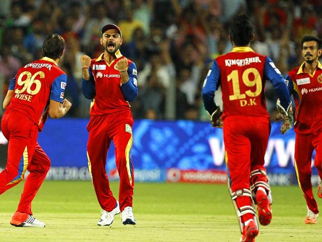 Royal-Challengers-Bangalore-players-celebrate-the-fall-of-Rajasthan-Royals-opener-Shane-Watson-RCB-outplayed-and-eliminated-RR-from-IPL-on-May-20-at-the-MCA-Stadium-in-Pune-Arijit-Sen-HT-Photo Royal-Challengers-Bangalore-players-celebrate-the-fall-of-Rajasthan-Royals-opener-Shane-Watson-RCB-outplayed-and-eliminated-RR-from-IPL-on-May-20-at-the-MCA-Stadium-in-Pune-Arijit-Sen-HT-Photo
