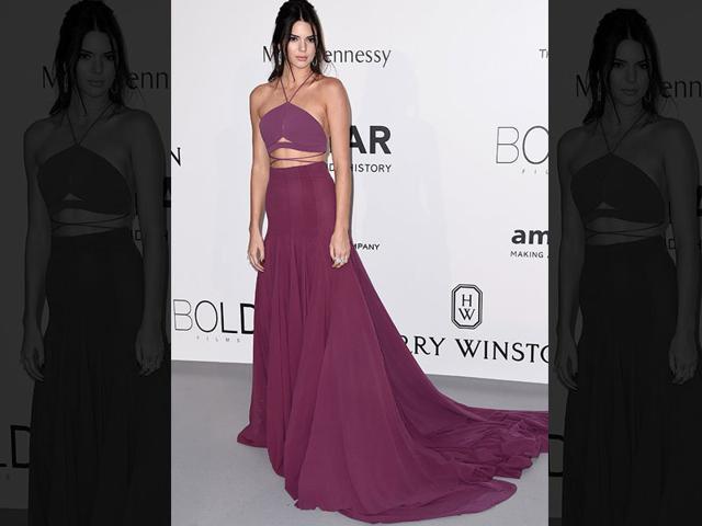 Kendall Jenner flaunts her toned midriff during the amfAR gala at the 68th Cannes Film Festival on Thursday. (AP)