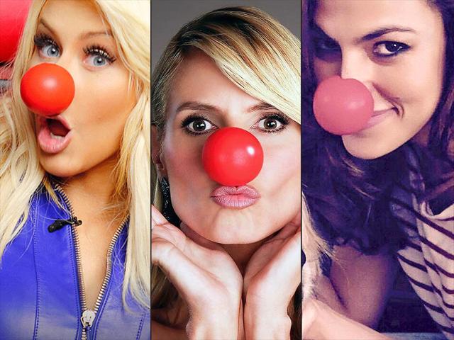 L to R : Christina Aguilera, Heidi Klum, Eva Mendes wear red clown noses as part of an effort to bring attention to Red Nose Day, which started in Britain in 1988 to raise money for poverty-stricken children in the UK and Africa. This year, the fund-raiser has extended to the United States. (Twitter) L to R : Christina Aguilera, Heidi Klum, Eva Mendes wear red clown noses as part of an effort to bring attention to Red Nose Day, which started in Britain in 1988 to raise money for poverty-stricken children in the UK and Africa. This year, the fund-raiser has extended to the United States. (Twitter)