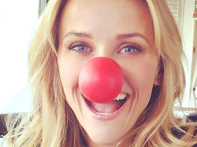 Reese Witherspoon wears a red clown nose as part of an effort to bring attention to Red Nose Day, which started in Britain in 1988 to raise money for poverty-stricken children in the UK and Africa. This year, the fund-raiser has extended to the United States. (Twitter) Reese Witherspoon wears a red clown nose as part of an effort to bring attention to Red Nose Day, which started in Britain in 1988 to raise money for poverty-stricken children in the UK and Africa. This year, the fund-raiser has extended to the United States. (Twitter)