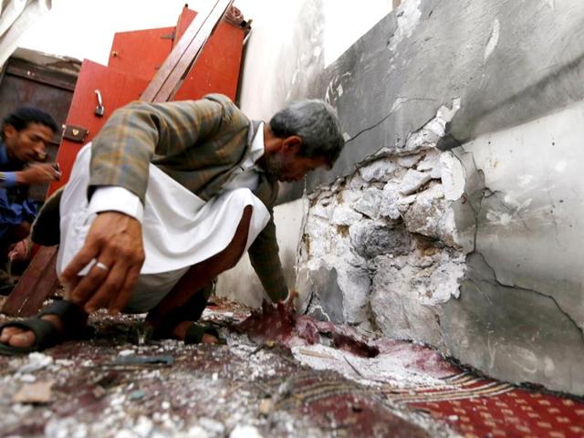 People-inspect-damage-caused-by-a-bomb-explosion-at-a-mosque-in-Yemen-s-capital-Sanaa-May-22-2015-The-Islamic-State-claimed-responsibility-for-the-attack-in-a-statement-on-Twitter-REUTERS People-inspect-damage-caused-by-a-bomb-explosion-at-a-mosque-in-Yemen-s-capital-Sanaa-May-22-2015-The-Islamic-State-claimed-responsibility-for-the-attack-in-a-statement-on-Twitter-REUTERS