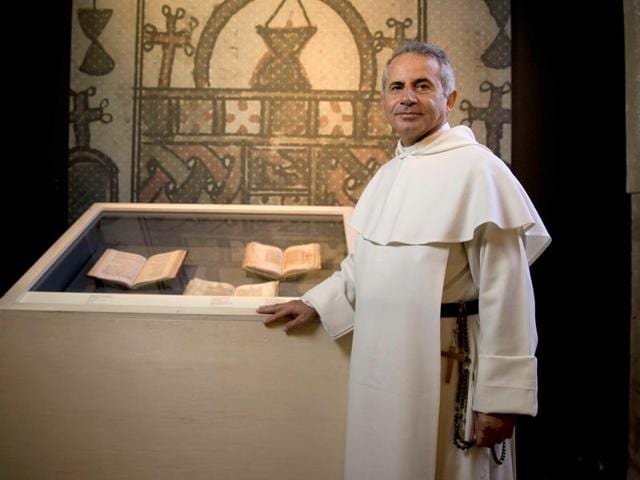 Iraqi-friar-Najeeb-Michaeel-of-the-Roman-Catholic-Dominican-Order-in-Paris-Michaeel-saved-hundreds-of-ancient-Christian-manuscripts-dated-between-the-13th-and-19th-century-from-IS-took-them-to-Kurdistan-AFP-Photo Iraqi-friar-Najeeb-Michaeel-of-the-Roman-Catholic-Dominican-Order-in-Paris-Michaeel-saved-hundreds-of-ancient-Christian-manuscripts-dated-between-the-13th-and-19th-century-from-IS-took-them-to-Kurdistan-AFP-Photo