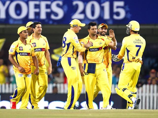 Suresh Raina of Chennai Super Kings (CSK) celebrates with teammates after taking the wicket of Royal Challengers Bangalore's (RCB's) Chris Gayle during their Indian Premier League (IPL) 2015 Qualifier 2 match in Ranchi on May 22. (Ajay Aggarwal/HT Photo)