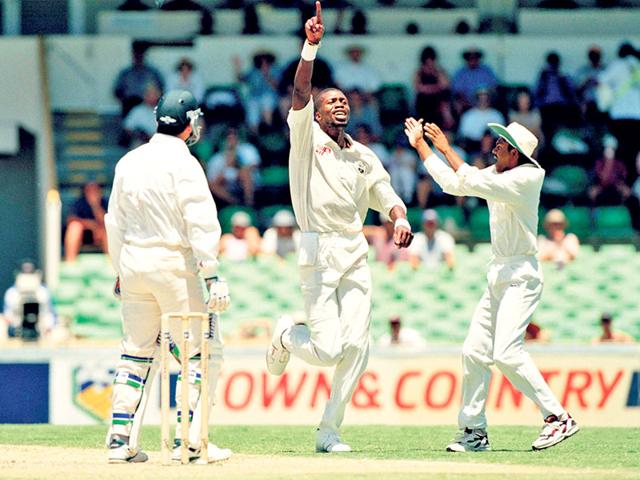 Ambrose-celebrates-the-wicket-of-Australia-batsman-Steve-Waugh-during-the-5th-Test-match-held-at-Perth-on-1st-February-1997-West-Indies-won-by-10-wickets-DAVID-MUNDEN-POPPERFOTO-GETTY-IMAGES