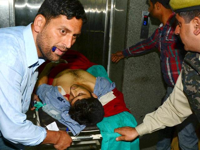 A-victim-being-taken-to-a-hospital-in-Srinagar-on-Monday-PTI-Photo A-victim-being-taken-to-a-hospital-in-Srinagar-on-Monday-PTI-Photo