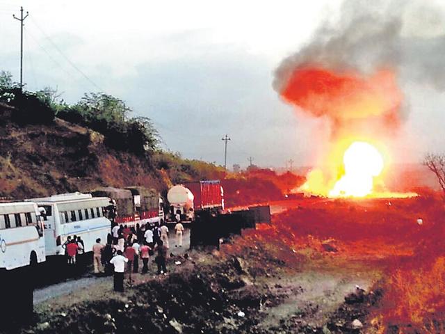 A-truck-carrying-the-cylinders-burst-into-flames-on-Mumbai-Goa-highway-HT-photo A-truck-carrying-the-cylinders-burst-into-flames-on-Mumbai-Goa-highway-HT-photo