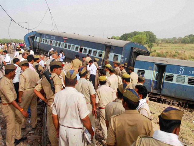 Policemen at the site of the accident. (PTI Photo)