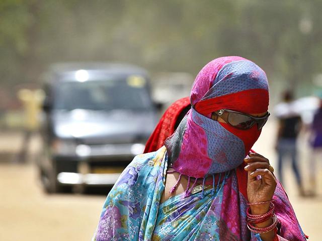 A-boy-washing-his-face-with-chilled-water-for-relief-from-scorching-heat-Bidesh-Manna-HT-Photo