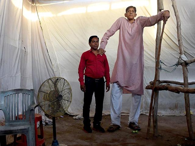 Dharmendra Singh: Meet India's tallest man - who says his 8ft 1in