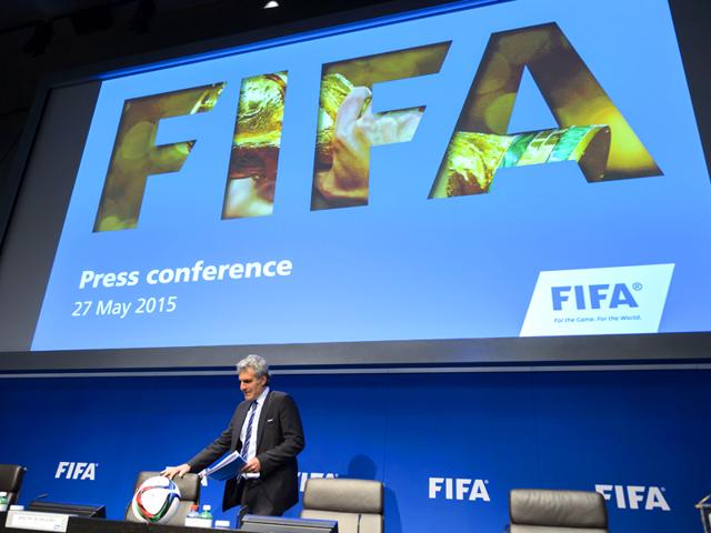 FIFA-spokesperson-Walter-De-Gregorio-arrives-to-give-a-press-conference-at-the-FIFA-headquarters-AFP-Photo-Fabrice-Coffrini FIFA-spokesperson-Walter-De-Gregorio-arrives-to-give-a-press-conference-at-the-FIFA-headquarters-AFP-Photo-Fabrice-Coffrini