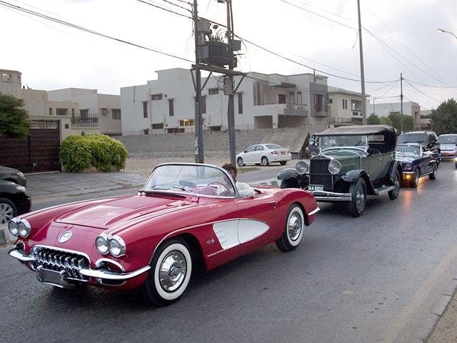 People-drive-their-classic-cars-on-a-street-in-Karachi-Pakistan-AP-Photo