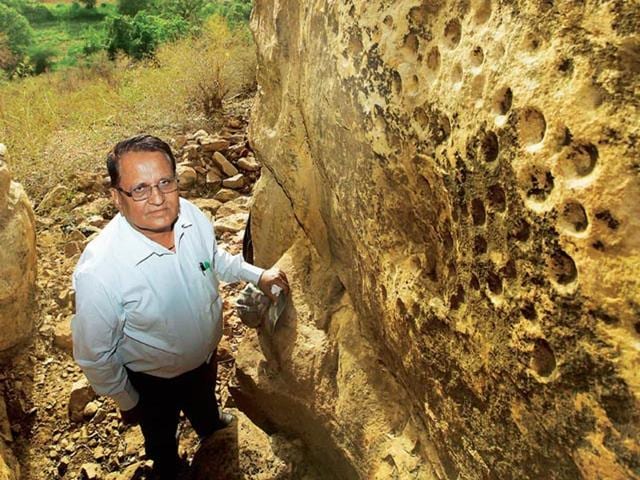 Pradyumn Bhatt helped discover several cup-like depressions in the Chaturbhuj Nala area. The impressions, called cupules, are said to me much older than the oldest rock art. 