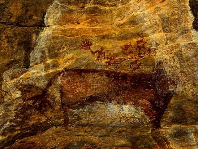 Several scenes depict man and cattle. In this one, the humans are tiny, the animal looms large. Perhaps they’re trying to fight or tame it? 