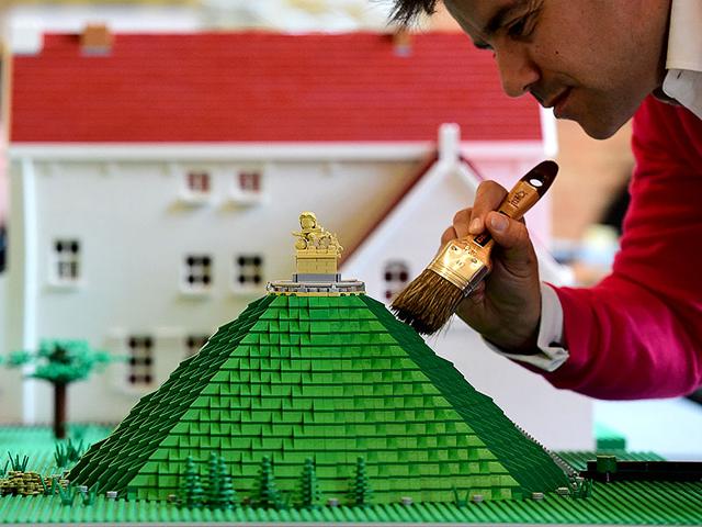 A Lego bricks replica of La Butte du Lion (The Lion’s Hill) , the main memorial monument of the Battle of Waterloo, is prepared prior to the opening of the “History in Bricks” exhibition, an exhibition recreating former French emperor Napoleon I life, in Waterloo as part of the celebrations marking the 200th anniversary of The Battle of Waterloo. (AFP PHOTO/Emmanuel Dunand) A Lego bricks replica of La Butte du Lion (The Lion’s Hill) , the main memorial monument of the Battle of Waterloo, is prepared prior to the opening of the “History in Bricks” exhibition, an exhibition recreating former French emperor Napoleon I life, in Waterloo as part of the celebrations marking the 200th anniversary of The Battle of Waterloo. (AFP PHOTO/Emmanuel Dunand)
