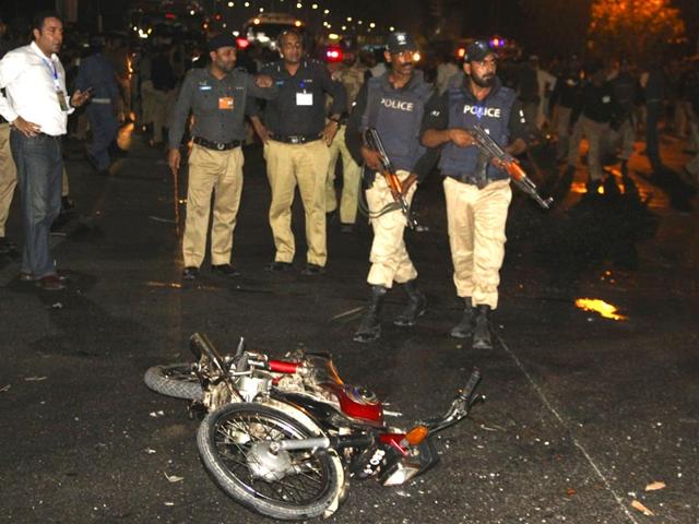Police-inspect-the-site-of-a-blast-that-occurred-during-the-cricket-match-between-Pakistan-and-Zimbabwe-near-Gaddafi-Stadium-in-Lahore-Pakistan-Reuters-Photo Police-inspect-the-site-of-a-blast-that-occurred-during-the-cricket-match-between-Pakistan-and-Zimbabwe-near-Gaddafi-Stadium-in-Lahore-Pakistan-Reuters-Photo
