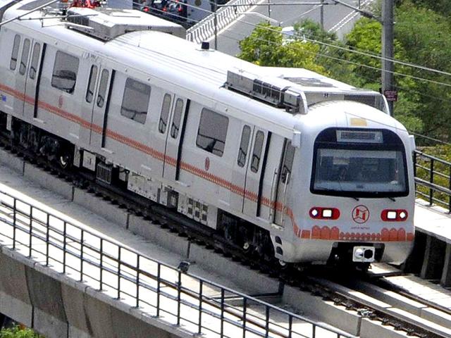 The-metro-train-runs-above-elevated-road-and-an-overbridge-on-Tuesday-Himanshu-Vyas-HT-Photo The-metro-train-runs-above-elevated-road-and-an-overbridge-on-Tuesday-Himanshu-Vyas-HT-Photo
