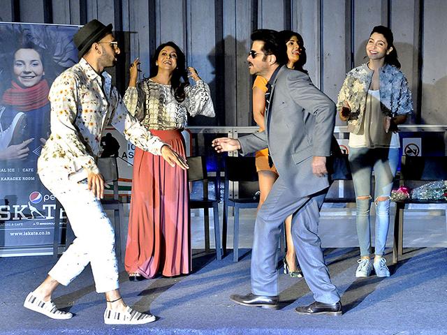 Who does it better, Baba or Lakhan?Anil Kapoor and Ranveer Singh show dance moves at promotional event for Dil Dhadakne Do in Ambience mall, in Gurgaon. (Photo by Parveen Kumar/HT)
