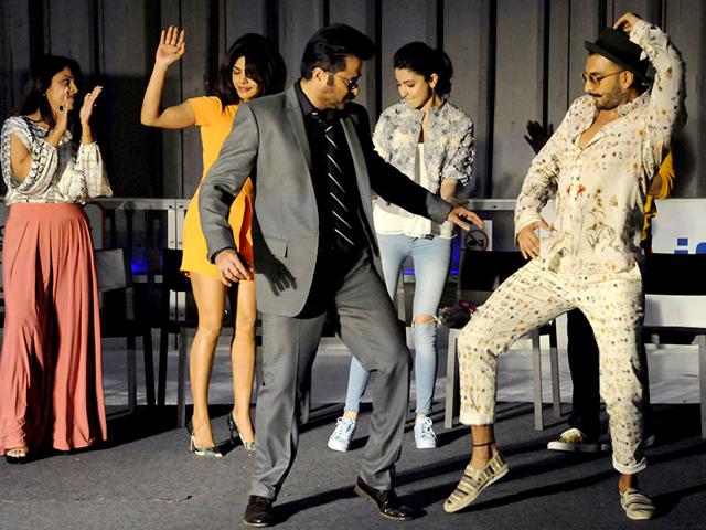 Aren't they playing Yaar Bina Chain Kaha Re? Anil Kapoor and Ranveer Singh have dance during the promotional event of their upcoming movie Dil Dhadakne Do in Ambience mall, in Gurgaon. (Photo by Parveen Kumar/HT)