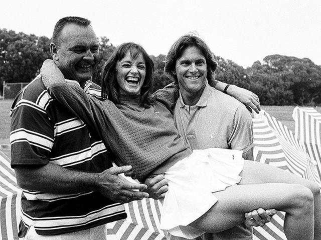 Olympian Bruce Jenner (R) poses with NFL player Dick Butkus and actress Pamela Sue Martin at the taping of the early reality show filming of tv show Star Games in Santa Barbara, California in this June 15, 1985 photo. (Reuters)