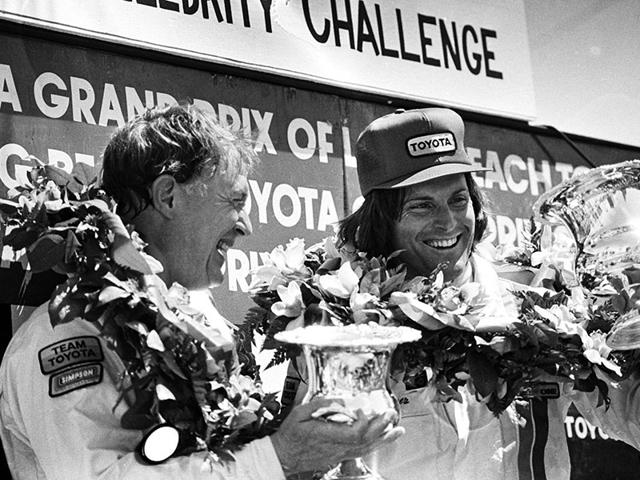 Racer Dan Gurney shares the Winner's Circle with Bruce Jenner (R) at the 1982 Toyota Pro/Celebrity Race at the Long Beach Grand Prix, in Long Beach, California in this April 3, 1982 photo. Jenner is transitioning to life as a woman and recently tweeted, "I'm so happy after such a long struggle to be living my true self. Welcome to the world Caitlyn. Can't wait for you to get to know her/me." (AP photo)