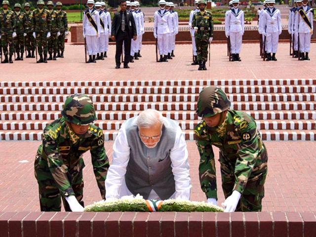 Prime Minister Narendra Modi lays a wreath at National Martyrs' Memorial in Dhaka. PTI Photo