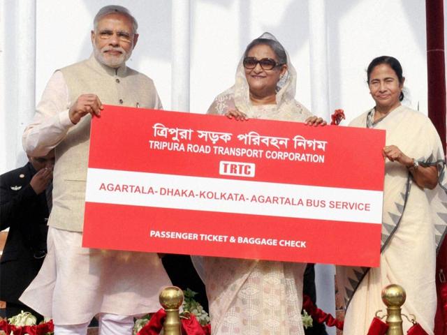 Prime Minister Narendra Modi, his Bangladeshi counterpart Sheikh Hasina and West Bengal chief minister Mamata Banerjee flagging off the Kolkata-Dhaka-Agartala bus service, in Dhaka . PTI Photo