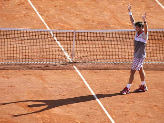 Stan Wawrinka of Switzerland celebrates after winning the men's singles final against Novak Djokovic of Serbia during the French Open in Paris, France. (Reuters Photo)