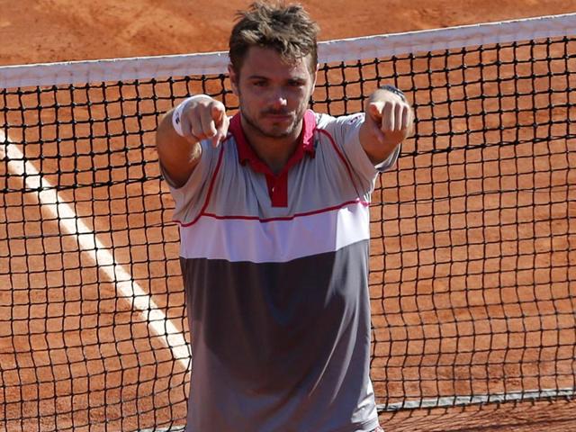 Switzerland-s-Stan-Wawrinka-points-to-his-player-s-box-after-defeating-Serbia-s-Novak-Djokovic-in-the-men-s-singles-final-of-the-French-Open-in-Paris-France-Wawrinka-won-4-6-6-4-6-3-6-4-AP-Photo
