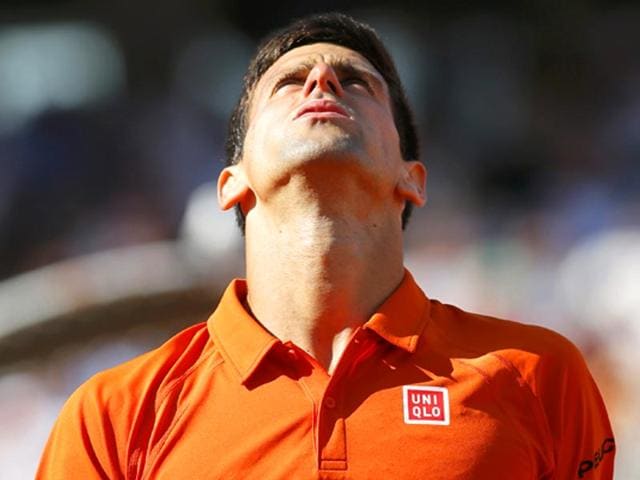 Novak Djokovic of Serbia reacts after losing a point during the men's singles final against Stan Wawrinka of Switzerland at the French Open in Paris, France. (Reuters Photo)